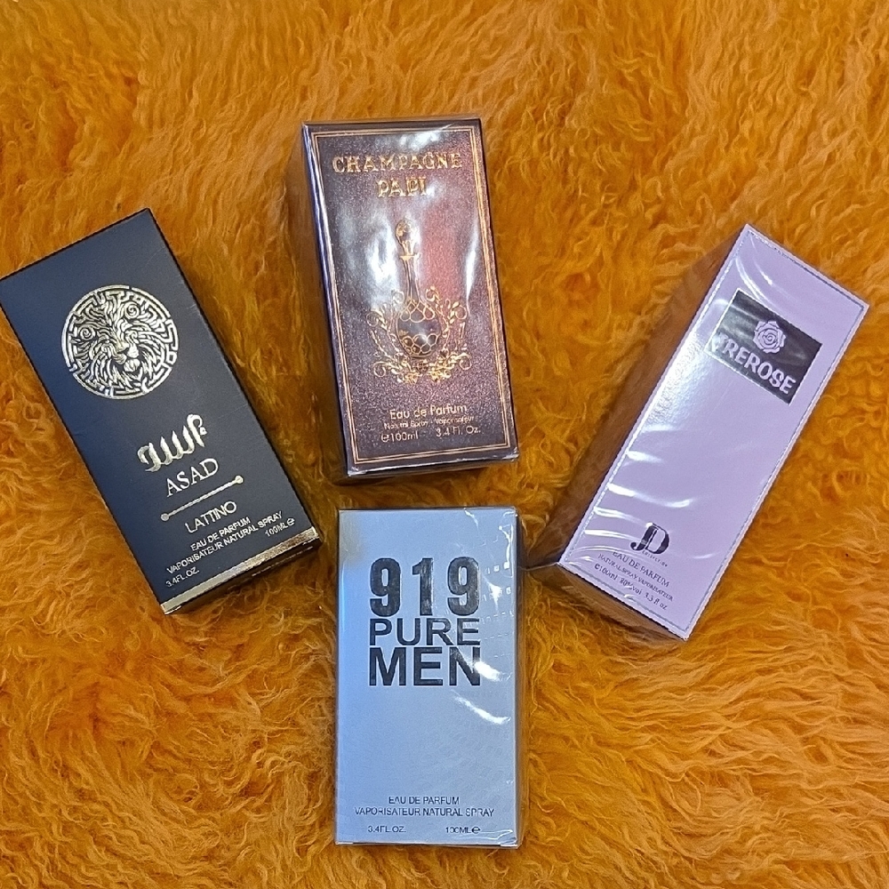 4 Lot Assorted Men & Women Perfume 3.4fl Oz. - Picture 1 of 5